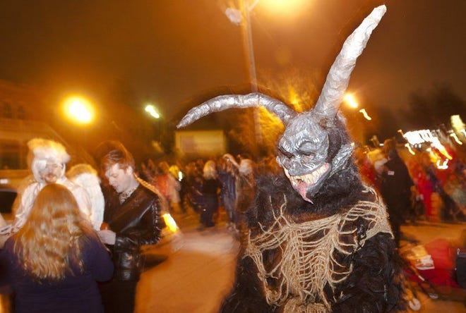 File photo from the 2014 Krampus Night parade and celebration in downtown Bloomington. Matthew Hatcher | The Herald-Times