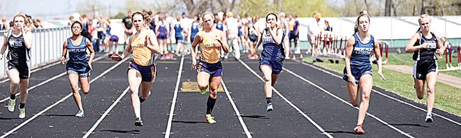 A group of area runners heads to the finish line in the girls’ 100-meter dash on Tuesday during the Eastern Coteau Conference track and field meet at Webster. Runners, from left, include Vanessa Klein of Tri-State, Mollie Anderson of Tri-State, Desi Swedeen of Florence-Henry, Anna Fritze of Great Plains Lutheran and Tegan Ronke of Waverly-South Shore. Klein won the event, followed by Fritze, Anderson and Ronke. Fritze later won the 200 and 400 dashes. Ronke won the pole vault. (Public Opinion photo by Boyd Tesch)