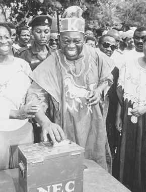Moshood Abiola is shown as he voted in Nigeria\'s 1993 presidential elections. Abiola, who had been imprisoned by Nigeria\'s military dictatorship since he apparently won the election, died Tuesday after becoming ill during a meeting with a visiting U.S. delegation. AP Photo