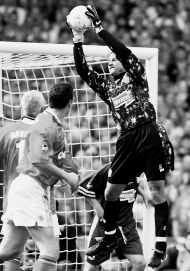 U.S. national goalkeeper Kasey Keller makes a save for Leicester City during the English Cup final at Wembley Stadium in 1997. AP photo