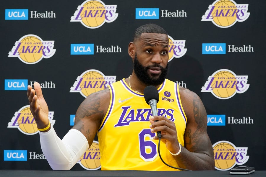 Los Angeles Lakers forward LeBron James fields questions during the NBA basketball team's Media Day Tuesday, Sept. 28, 2021, in El Segundo, Calif. (AP Photo/Marcio Jose Sanchez)