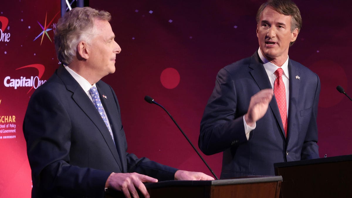 Republican Glenn Youngkin, right, makes a point to Democrat Terry McAuliffe on Sept. 28, 2021, in the final debate between the candidates before the gubernatorial election on Nov. 2.