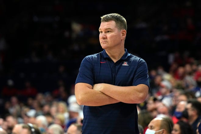 Arizona coach Tommy Lloyd watches during the first half of the team's NCAA college basketball game against Northern Arizona, Tuesday, Nov. 9, 2021, in Tucson, Ariz. (AP Photo/Rick Scuteri)
