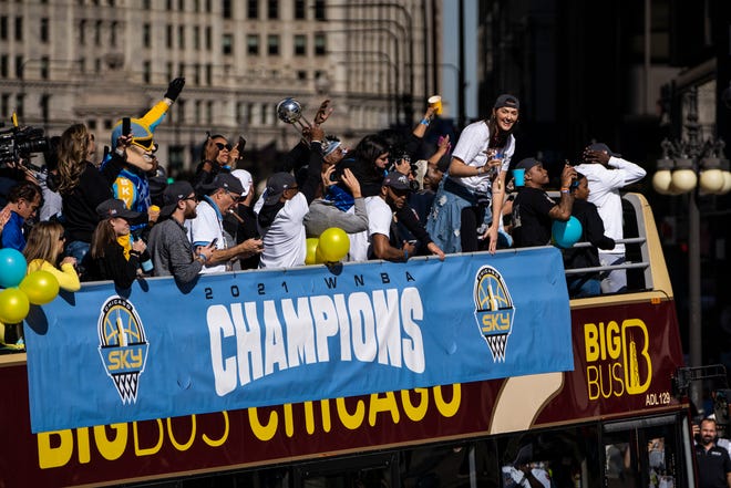 Members of the Chicago Sky parade down Michigan Avenue to celebrate their WNBA championship on Oct. 19.