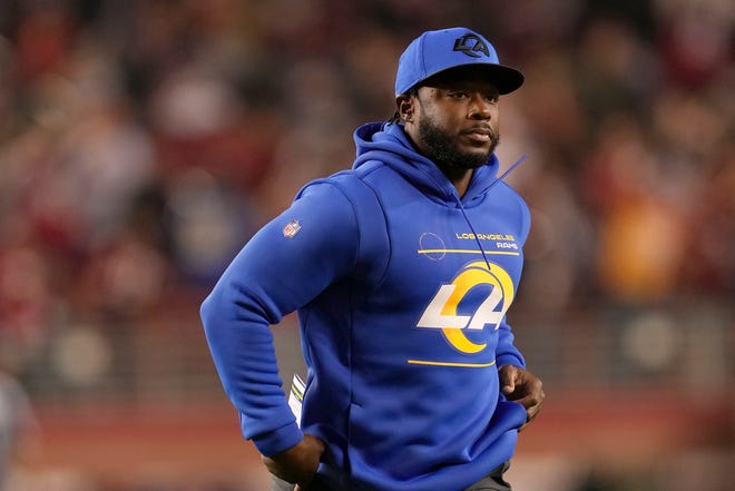 ARCHIVE - Los Angeles Rams running backs coach Thomas Brown is shown during an NFL football game against the San Francisco 49ers in Santa Clara, Calif., Monday, Nov. 15, 2021. Brown was a running back five-star bound for the University of Georgia back then, in the early 2000s, his mind was on the Bulldogs and the NFL.  He hadn't even imagined trading his cleats for a whistle... 