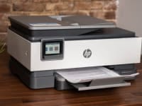 Photo of a white-and-gray HP OfficeJet printer.