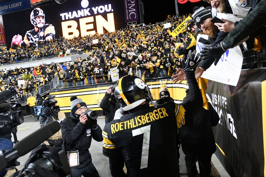 Fans cheer Pittsburgh Steelers quarterback Ben Roethlisberger after an NFL game against the Cleveland Browns on Jan. 3 in Pittsburgh. The Steelers won 26-14. Roethlisberger announced his retirement on  Jan. 27, saying it was "time to clean out my locker, hang up my cleats" after 18 years, two Super Bowls, team records and a spot in the Hall of Fame all but secure.