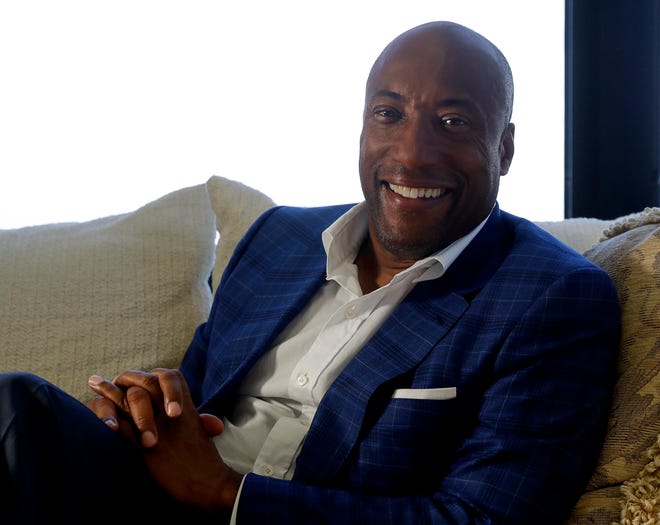 FILE - Comedian and media mogul Byron Allen poses for photo Sept. 5, 2019, in Los Angeles. Allen says the NFL needs him to join the ownership group. Allen is preparing a bid to purchase the Denver Broncos and become the NFL's first Black owner. (AP Photo/Chris Carlson, File)