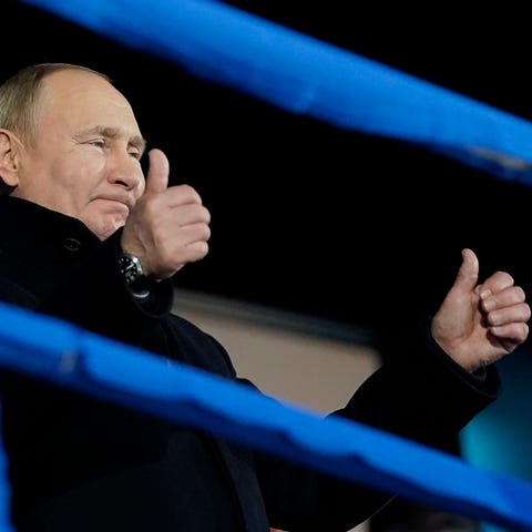 Russian President Vladimir Putin attends the openi