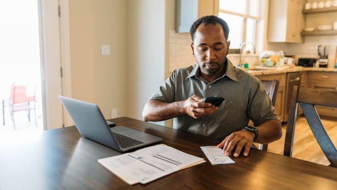 Credit: Getty Images / RichVintage You need to hold onto your tax documents, but that doesn't mean you need physical copies.