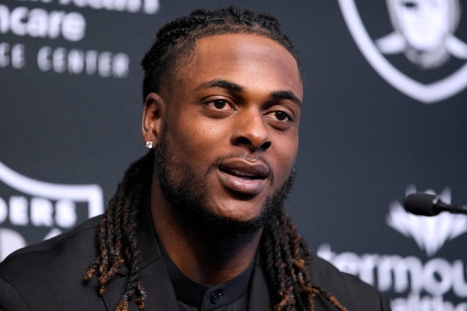 Las Vegas Raiders wide receiver Davante Adams speaks during an NFL football news conference Tuesday, March 22, 2022, in Henderson, Nev. (AP Photo/John Locher)
