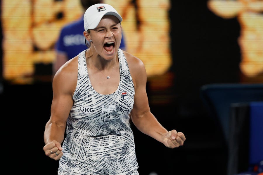 FILE - Ash Barty of Australia celebrates after defeating Danielle Collins of the U.S., in the women's singles final at the Australian Open tennis championships in Melbourne, Australia on Jan. 29, 2022. In shock announcement Wednesday, March 23, 2022, No. 1-ranked Barty announced her retirement from tennis. (AP Photo/Hamish Blair, File)
