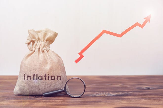 A bag that says Inflation with an up arrow next to it.