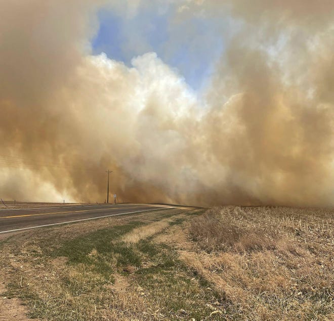Smoke billows from a wildfire near Cambridge, Neb. Several small towns, including Cambridge, Bartley, Indianola and Wilsonville, in Nebraska’s southwest and Macy in its northeast were forced to temporarily evacuate because of the wind-driven wildfires.