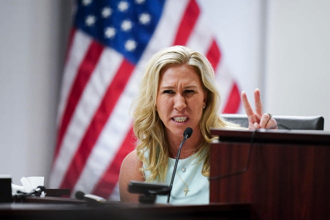 U.S. Rep. Marjorie Taylor Greene speaks during a hearing Friday in Atlanta over a challenge filed by voters who say she shouldn’t be allowed to seek reelection because she helped facilitate the attack on the Capitol that disrupted certification of Joe Biden’s presidential victory.