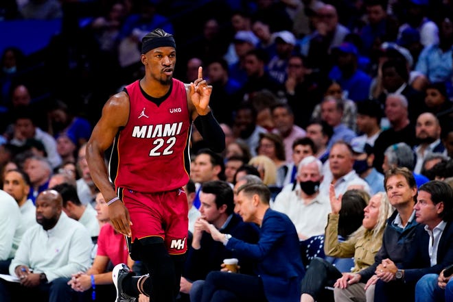 Miami Heat's Jimmy Butler gestures as he runs down the court during the second half of Game 6 of an NBA basketball second-round playoff series against the Philadelphia 76ers, Thursday, May 12, 2022, in Philadelphia. (AP Photo/Matt Slocum)