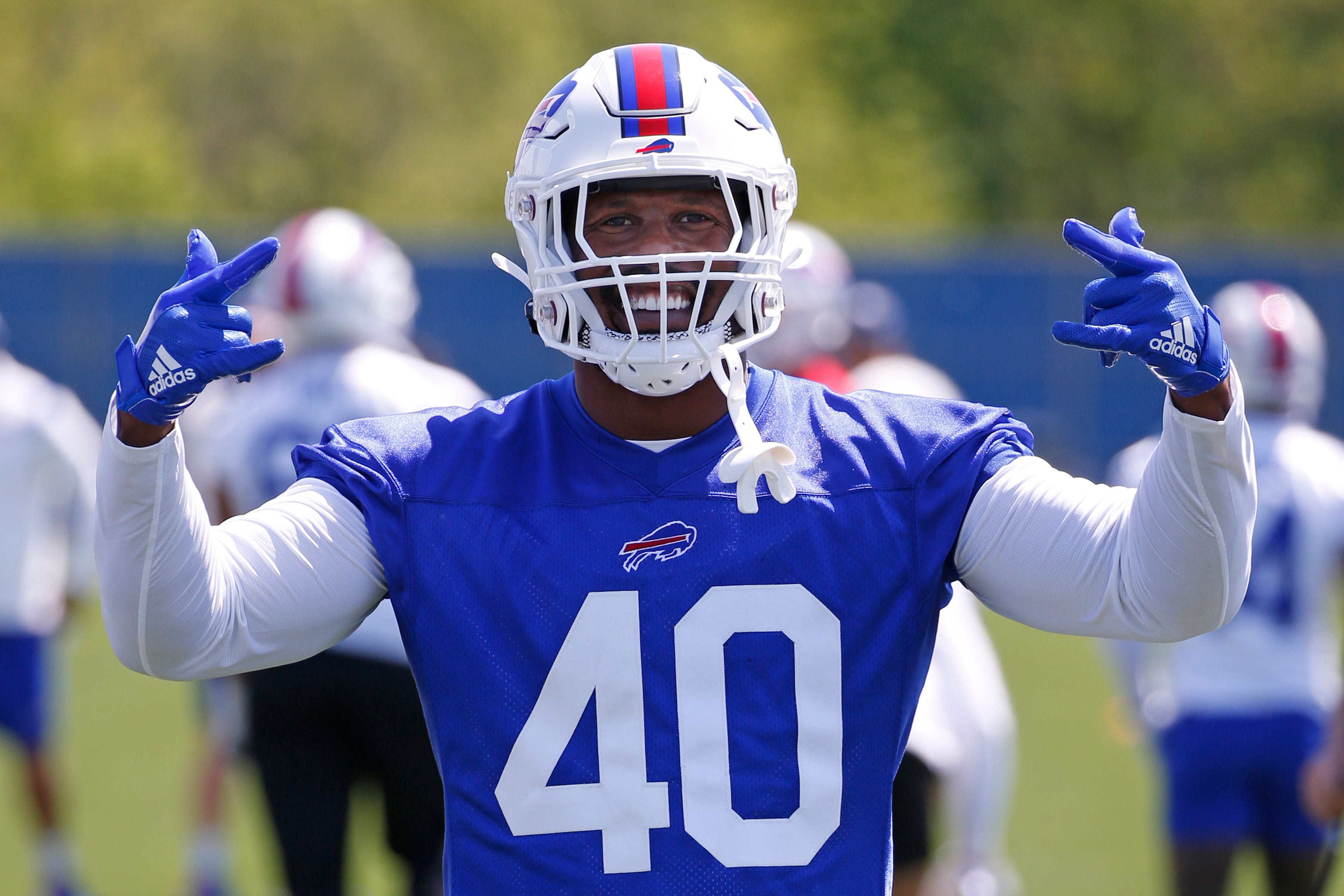 Von Miller poses for the camera during the Bills OTAs
