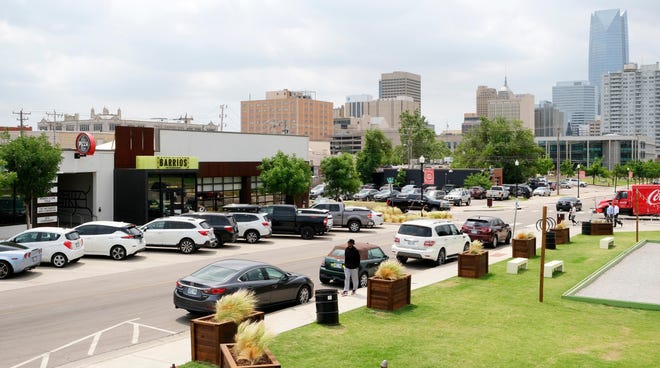 Free parking spots in Oklahoma City’s Midtown area, as shown along Hudson Avenue between NW 9 and NW 10, might soon be turned into metered spaces.