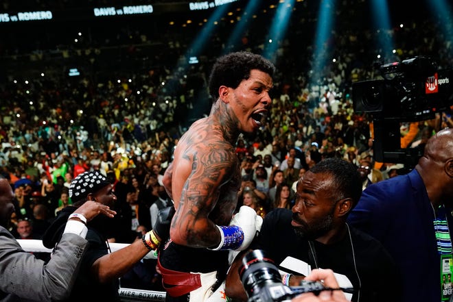 Gervonta Davis reacts after defeating Rolando Romero during the sixth round of a WBA lightweight championship boxing bout early Sunday, May 29, 2022, in New York. His large, young fanbase could help revive boxing.
