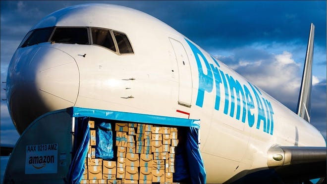 Packages being loaded onto an Amazon Prime aircraft.
