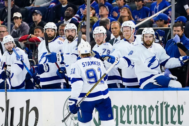 Tampa Bay Lightning's Steven Stamkos (91) is congratulated after scoring a goal against the New York Rangers during the first period in Game 1 of the NHL hockey Stanley Cup playoffs Eastern Conference finals Wednesday, June 1, 2022, in New York.  (AP Photo / Frank Franklin II)
