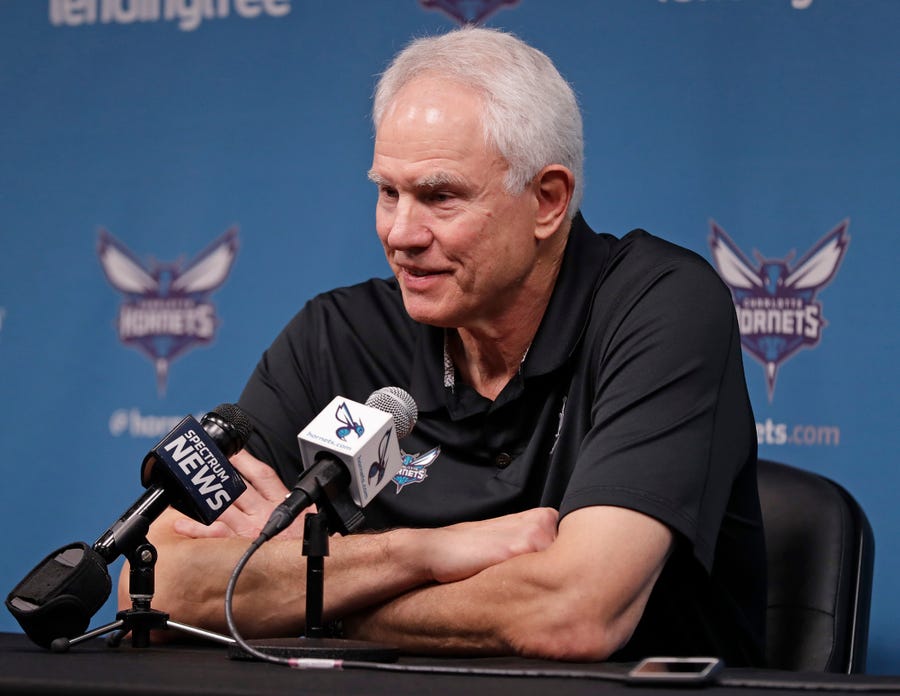FILE - Charlotte Hornets general manager Mitch Kupchak speaks to the media during a news conference for the NBA basketball team in Charlotte, N.C., April 12, 2019. The Charlotte Hornets have two picks in the first round of the NBA draft on Thursday June 23, 2022 -- and no head coach in place to help facilitate those decisions. Hornets owner Michael Jordan is still searching for the organization's next coach after Golden State Warriors assistant Kenny Atkinson on Saturday abruptly backed out of a four-year   agreement to coach the team. General manager Mitch Kupchak is expected to make final decisions with input from Jordan. (AP Photo/Chuck Burton, File)
