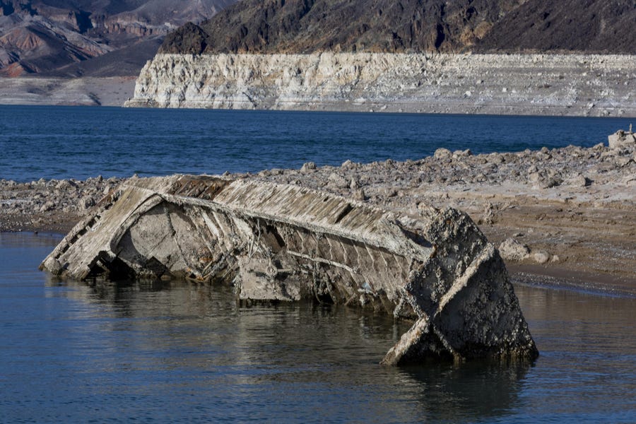 A WWII-era landing craft used to transport troops or tanks was revealed on the shoreline near the Lake Mead Marina in Boulder City, Nev., as the waterline drops.
