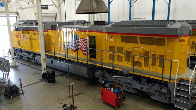 A modernized Union Pacific locomotive is prepped for delivery at Wabtec’s plant in Fort Worth, Texas. Union Pacific, based in Omaha, Neb., will spend more than $1 billion to upgrade 600 of its old diesel locomotives over the next three years and make them more efficient.