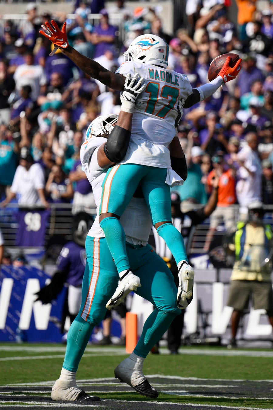 Miami Dolphins wide receiver Jaylen Waddle (17) celebrates after a touchdown during the second half of an NFL football game against the Baltimore Ravens, Sunday, Sept. 18, 2022, in Baltimore. (AP Photo/Nick Wass)