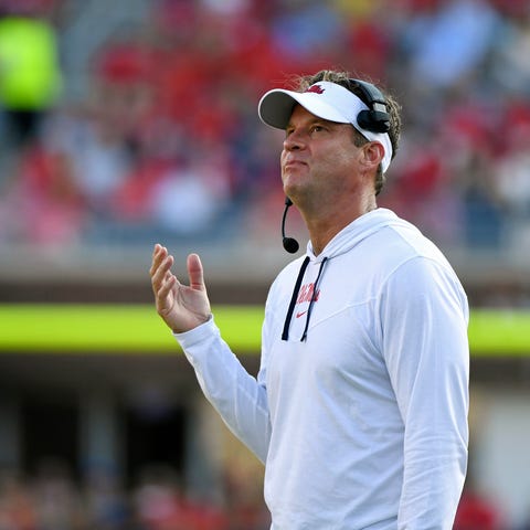 Mississippi head coach Lane Kiffin watches during 