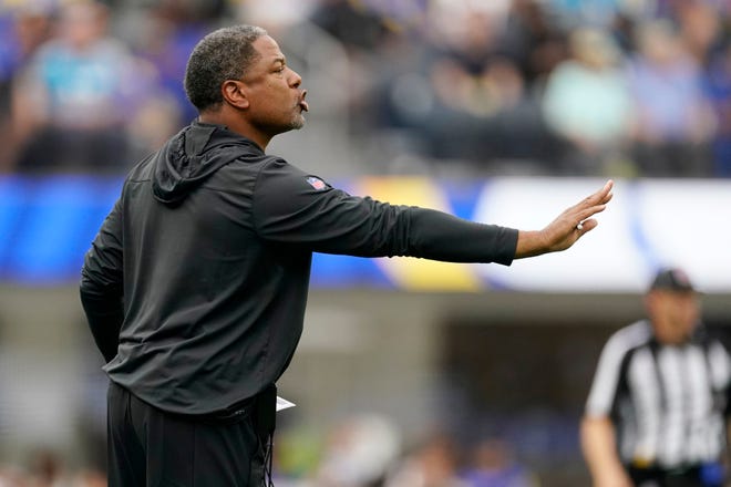 Carolina Panthers head coach Steve Wilks signals from the sideline during the first half of an NFL football game against the Los Angeles Rams Sunday, Oct. 16, 2022, in Inglewood, Calif. (AP Photo/Ashley Landis)