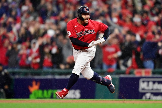 Josh Naylor celebrates as he runs the bases after hitting a fourth-inning home run for the Guardians in Game 4 of an AL Division Series against the New York Yankees, Sunday, Oct. 16, 2022, in Cleveland.