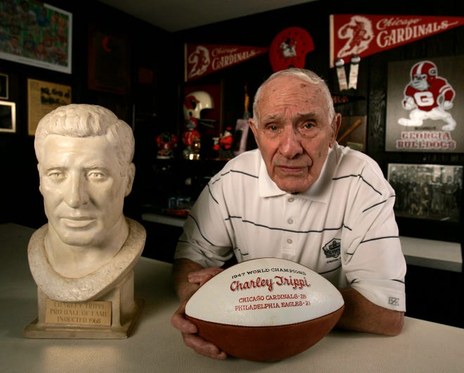 Pro Football Hall of Fame member Charley Trippi poses with memorabilia at his home in Athens, Georgia, in 2009.