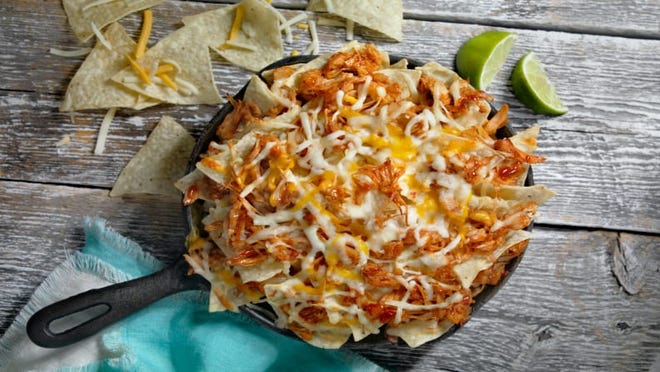 When seasoned appropriately, jackfruit tastes similar to pulled pork—making it a perfect topping for nachos.