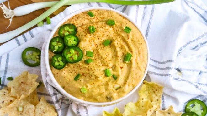 Using a base like cashews and nutritional yeast brings a cheesy, umami-like flavor to your vegan queso dip.