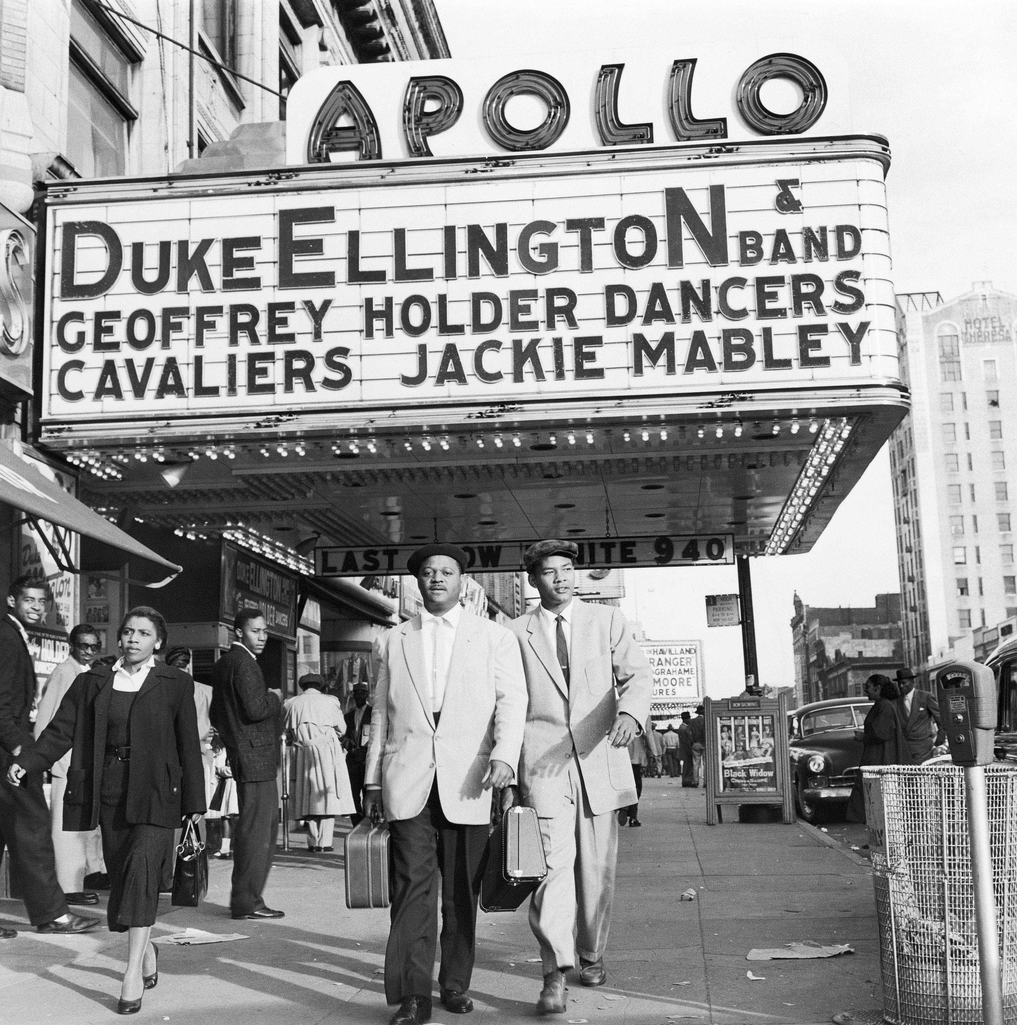 In this 1955 file photo, trumpeter Clark Terry walks with his son Rudolph under the Apollo Theater marquee after Terry's first stage show with Duke Ellington's band in the Harlem neighborhood of New York City. The documentary “Keep on Keepin’ On,” which is being show at the Lyric Cinema Cafe in Fort Collins tells the tale of Terry’s career as an influential trumpet player and studio musician.