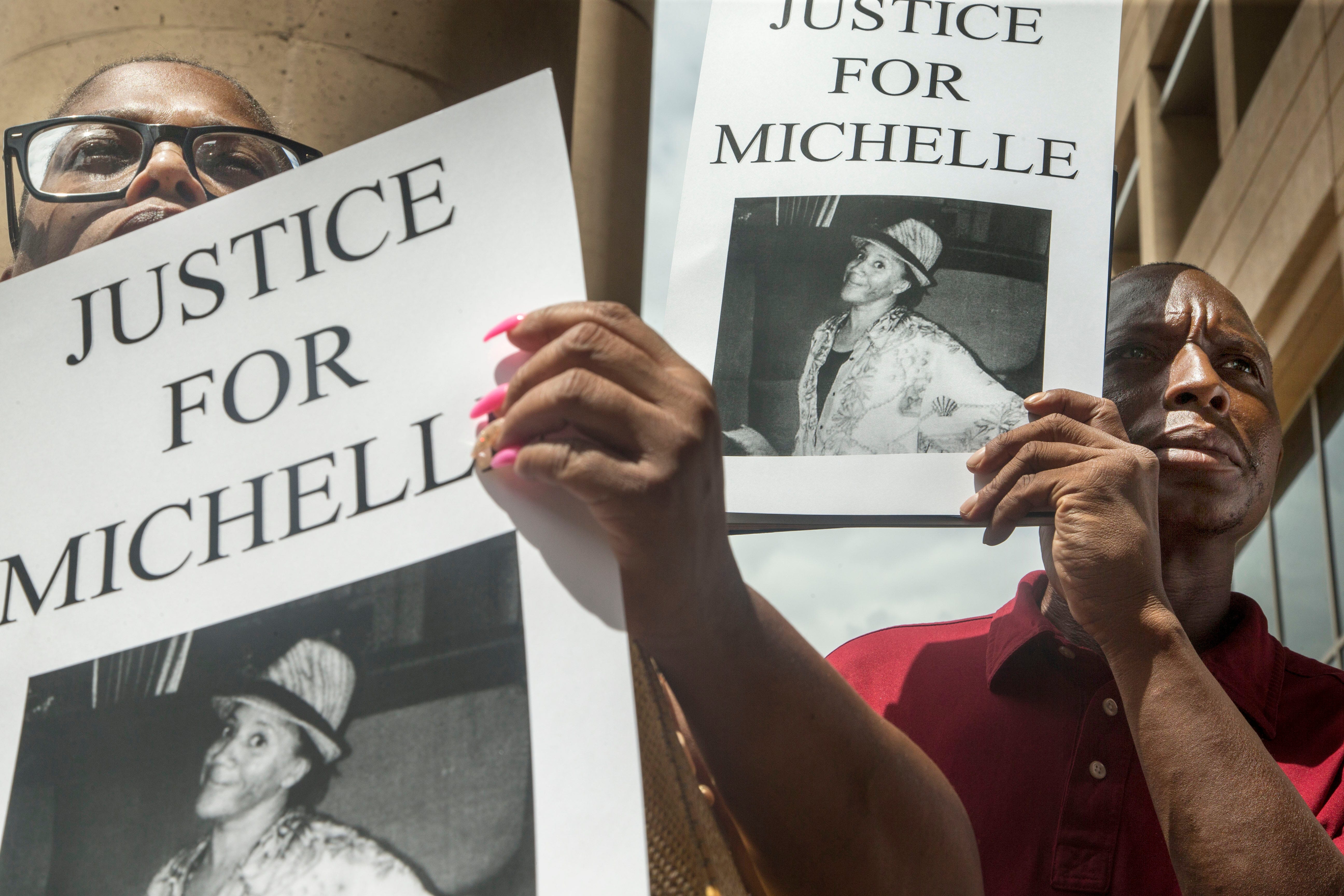 People protest the death of Michelle Cusseaux in 2014 in Phoenix.