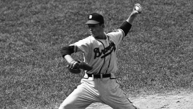 Boston Braves' Johnny Antonelli, 18-year-old pitcher, is shown on the mound for the Braves pitching against the Phillies in Philadelphia in his first major league game, July 4, 1948.