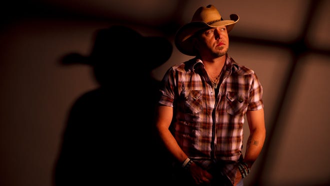 Jason Aldean poses for a portrait before performing at the 2012 CMA Music Festival concert at LP Field. 
