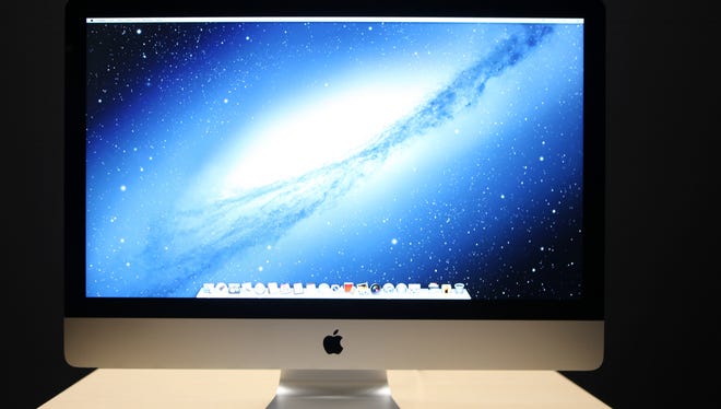 Apple's new slimmed-down iMac will go on sale Friday.