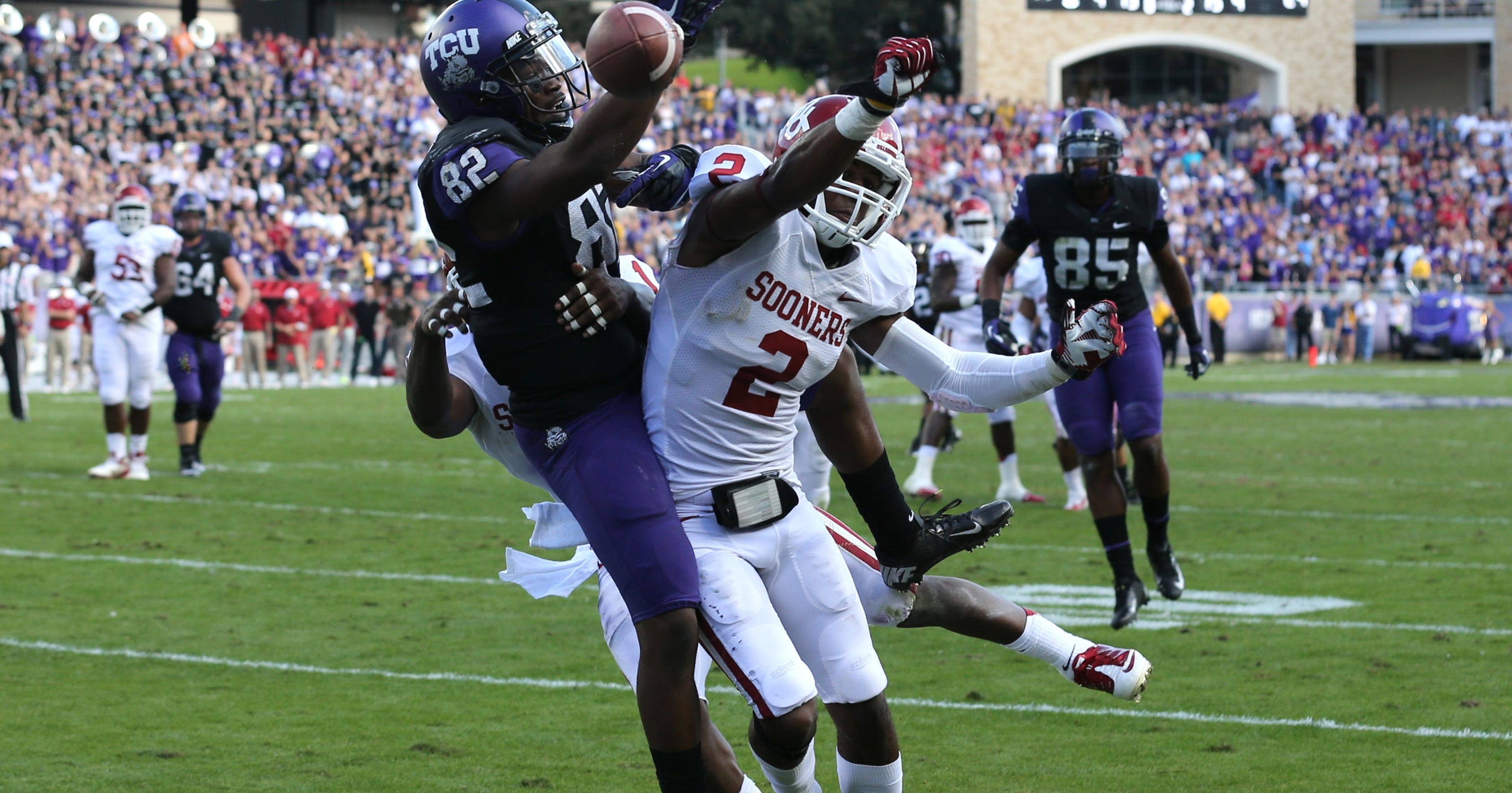 No. 11 Oklahoma holds off TCU to clinch share of Big 12 title