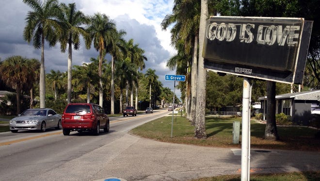 The neon God Is Love sign, a sentinel of faith along McGregor Boulevard in Fort Myers, Fla., since 1943, has an uncertain future.