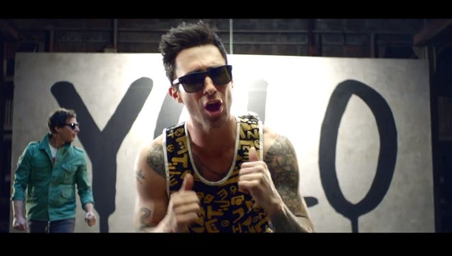 Screengrab from Lonely Island's 'YOLO' video, featuring Adam Levine and Kendrick Lamar.