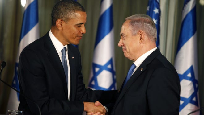 President Obama greets Israeli Prime Minister Benjamin Netanyahu during a press conference in Jerusalem on Wednesday.