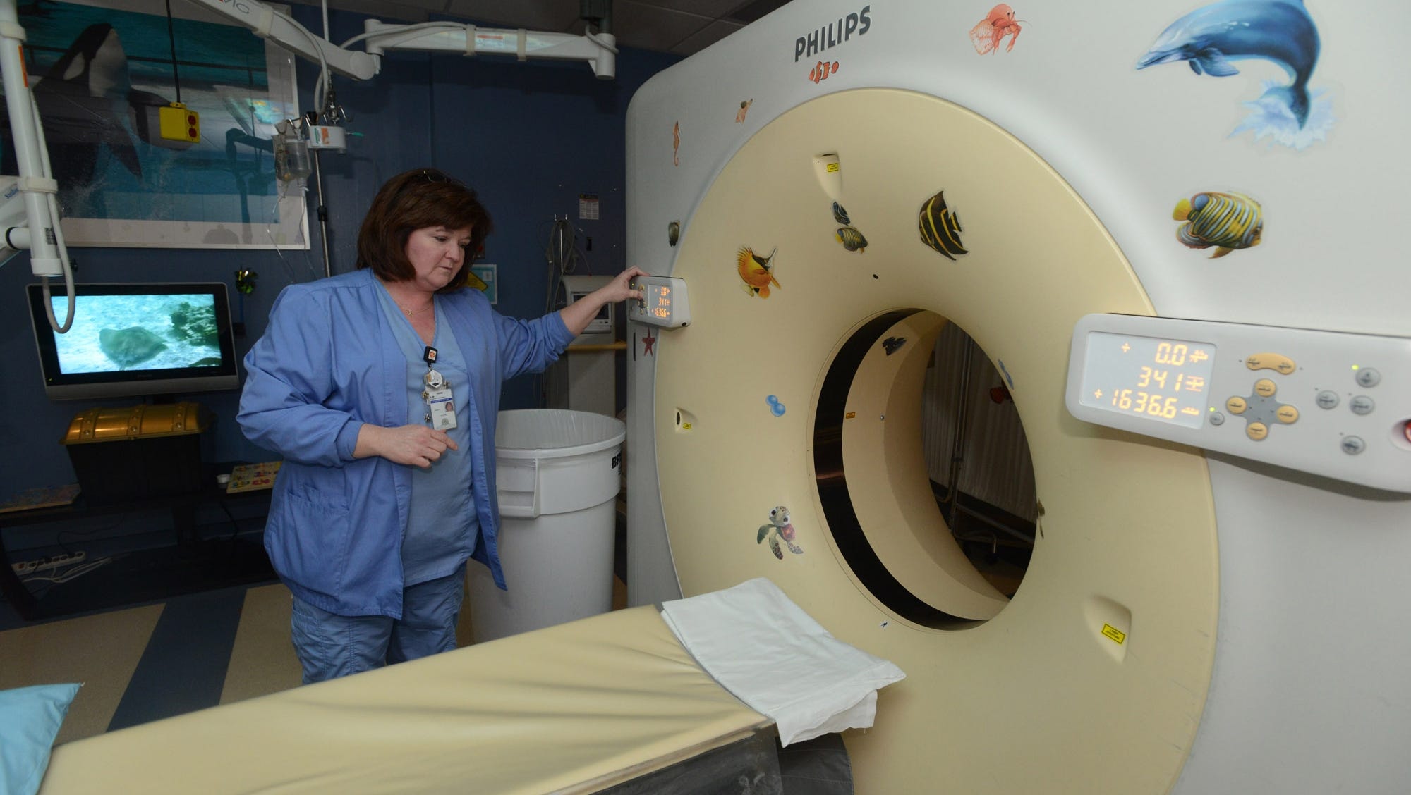 Experts weigh risks CT scans