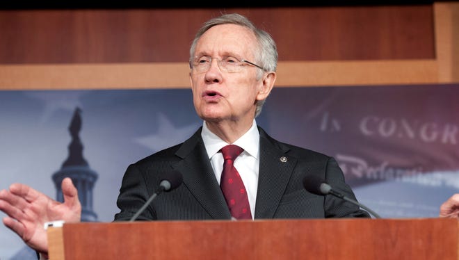 Senate Majority Leader Harry Reid, D-Nev., speaks to reporters on Capitol Hill on March 14.