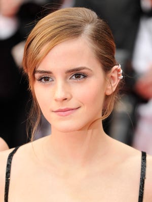 Actress Emma Watson attends 'The Bling Ring' premiere during The 66th Annual Cannes Film Festival at the Palais des Festivals .