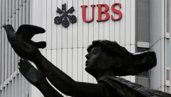 UBS will pay about $415 million to Fannie Mae and $470 million to Freddie Mac to settle U.S. claims.
