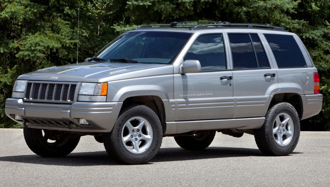 Chrysler has agreed to recall 1.56 million Jeep Grand Cherokee and Liberty models, including this 1998 Grand Cherokee.The government originally wanted 2.7 million 1993-2004 Jeep Grand Cherokees and 2002-07 Jeep Libertys recalled, but Grand Cherokees newer than 1998 have been dropped.
