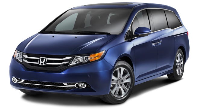 Honda starts selling the updated, 2014 version of its Odyssey family van July 2, with only a slight price increase. Shown: Top-end Touring Elite with built-in vacuum.